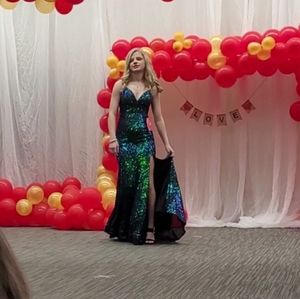 Beautiful emerald green formal dress. Worn once for 3 hours. No alterations.